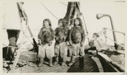 Image of Three Eskimo [Inughuit] boys on the deck of Roosevelt